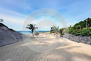 Entrance to the Atlantic ocean sandy beach at Adeje town on Tenerife