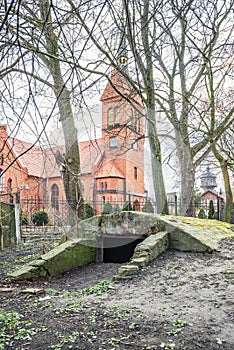 Entrance to the basement or old bunker in front of the Gothic cathedral