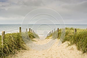Entrance to the beach on the Dutch west coast near Katwijk, the Netherlands photo