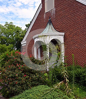 Entrance to Brick Church With White Portico