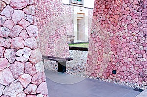 Entrance to the building with pink round walls