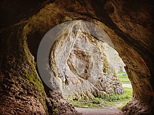 Entrance to the cave from the Gorges of Dobrogea photo