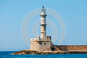 Entrance to Chania harbor with lighthouse, Crete, Greece