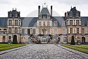 Entrance to the Chateau de Fontainebleau, Paris photo