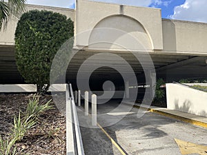 Entrance to a concrete single deck parking garage