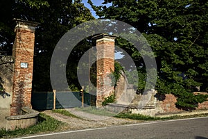 Entrance to a country mansion in the italian countryside on a sunny day
