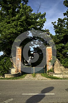 Entrance to a country mansion in the italian countryside on a sunny day