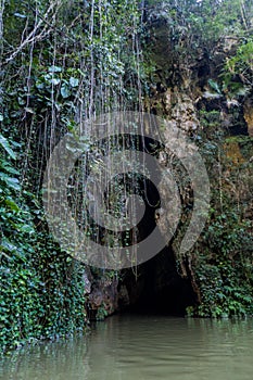 Entrance to Cueva del Indio cave in National Park Vinales, Cub photo