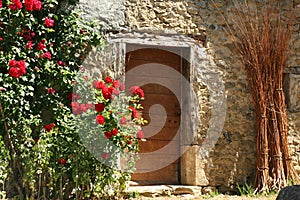 The entrance to a farm with a climbing rose