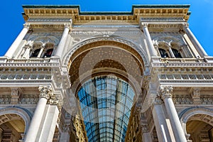 Entrance to Galleria Vittorio Emanuele II closeup, Milan, Italy. This gallery is luxury mall and famous tourist attraction of