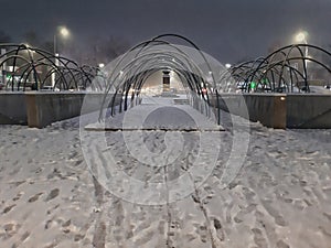 when the entrance to the garden is covered with snow at night