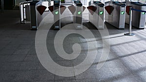 Entrance to metro station turnstiles,subway walking in the Entrance of Underground station