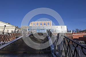 Entrance to the Moscow Kremlin for tourists through Kutafiya tower on a sunny winter day, Russia