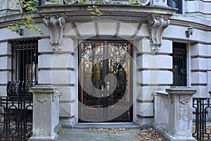 Entrance to ornate old stone townhouse