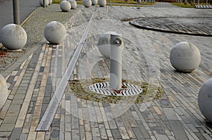 Entrance to the park is secured against the entry of cars by placing concrete balls attached to the paving or asphalt. protection
