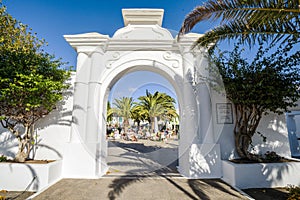 Entrance to picturesque settlement called Pueblo Marinero designed by Cesar Manrique located in Costa Teguise, Lanzarote, Canary photo
