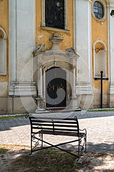 Church entrance and a cross Jablonica