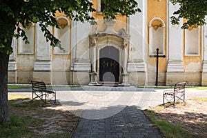 Church entrance and a cross Jablonica