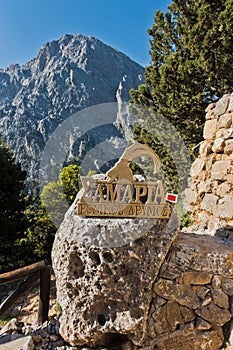 Entrance to Samaria gorge surrounded by very high mountains, south west part of Crete island