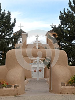 The entrance to the San Francisco de Asis Church in Taos, Mew Me photo