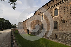 Entrance to the Sforzesco castle and its beautiful medieval walls