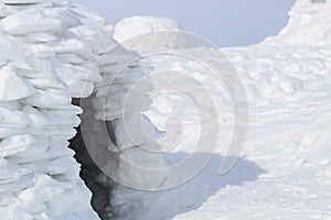 Entrance to the snow cave - Igloo eskimo house