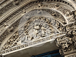 Entrance to St Michael, Cornhill church London, with war memorial to the right