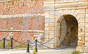 entrance to a stone castle with a large gate through a chain bridge. Belgrad, Serbia