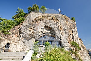 Entrance to the Temple of the Pauline Order in the rock at the G photo