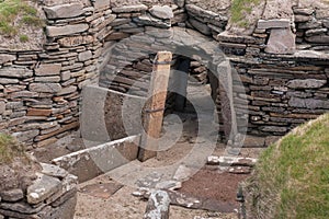 Entrance to underground dwelling at Skara Brae.