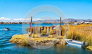 Entry to Uros Floating Islands on Lake Titicaca in Peru photo