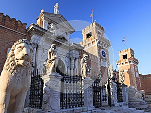 Entrance to the Venetian Arsenal with its permanent guard of marble lions. photo