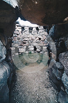 Entrance of a very old tower Nuraghe near Barumini in Sardinia - Italy.