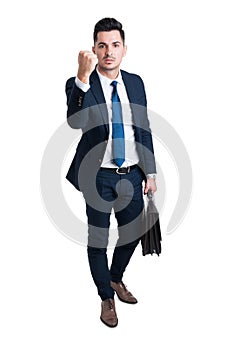 Entrepreneur or boss manager threatening with his fist