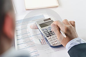 Entrepreneur calculate financial cost. Businessman planning to extend business and calculating budget for develop.