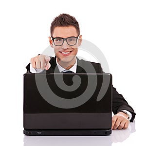 Entrepreneur at his desk working on laptop