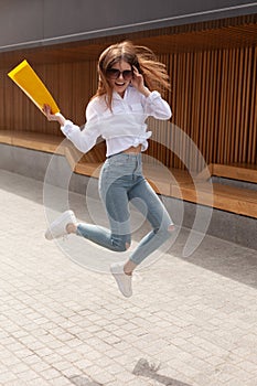 The entrepreneur`s project was approved. The girl is jumping for reference. The.happy student successfully defended the thesis