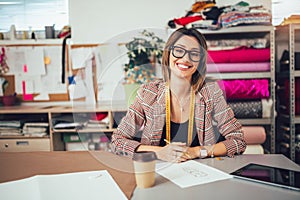Entrepreneur woman, or fashion designer working in atelier