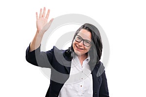 Entrepreneur woman with friendly expression waving hand