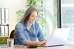 Entrepreneur working with a laptop photo
