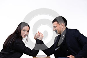 Entrepreneurs and armwrestling. Businessman with closed mouth. The businesswoman wins. Gender neutral concept