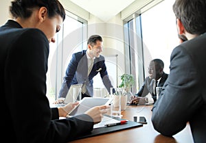 Entrepreneurs and business people conference in modern meeting room.