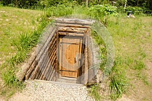 Entry of Forest Brothers partisans bunker in Ile, Latvia photo