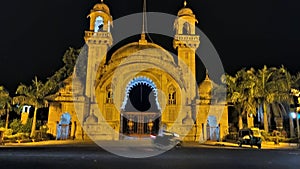 Entry gate of laxmi Vilas palace at night photo