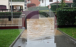 Entry of a House during a flood and flooded road