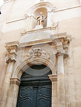 The entry and sculpture on the church