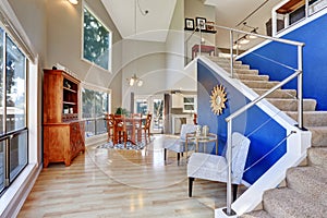 Entryway with hardwood floor and staircase