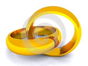 Entwined gold rings on white background