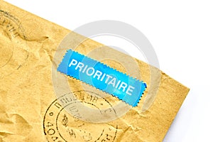 Envelope with blue prioritaire mail sticker