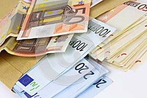 Envelope full of euro cash